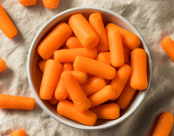 A picture of baby carrots in a bowl