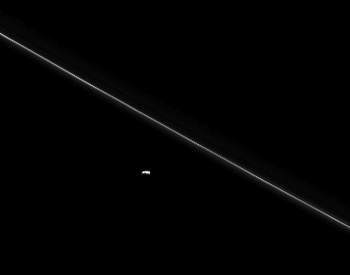 A photo of Saturn's moon Pandora by its F ring