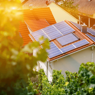 A picture of a house with solar panels