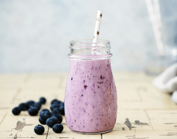 A picture of a smoothie that is made of blueberries