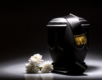 A picture of a urn with cremated remains