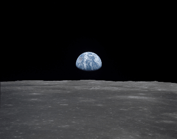 A picture of the earth from the surface of the moon.