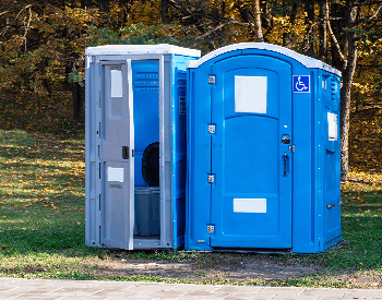 A picture of a portable toliet used for pooping and peeing