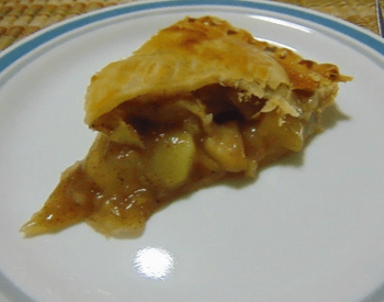 A picture of a slice of apple pie