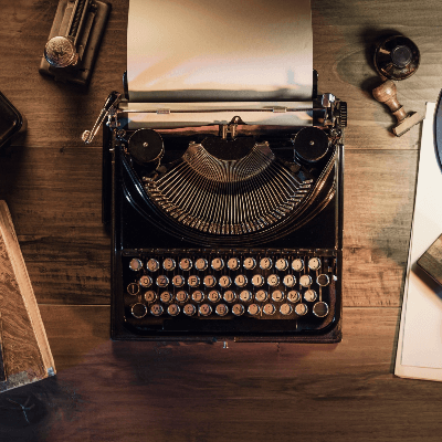 A typewriter on a desk