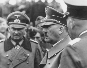 A picture of Adolf Hitler inspecting his troops in France.