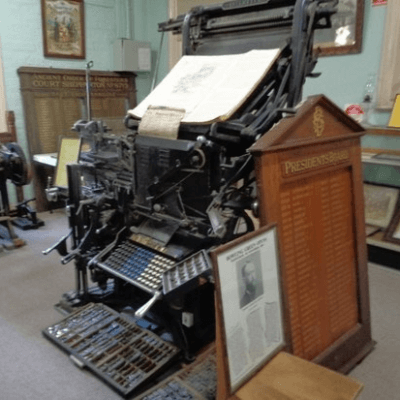 A picture of an early printing press
