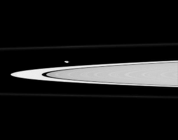 A photo of Atlas ouside of one of Saturn's rings