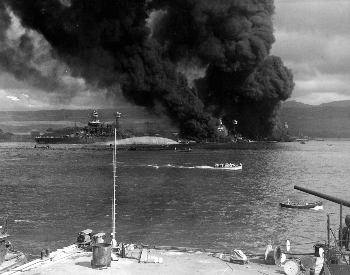 A picture of Battleship Row after the Japanese attack on Pearl Harbor