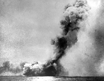 A picture of the British Battle Cruiser HMS Queen May exploding at the Battle of Jutland