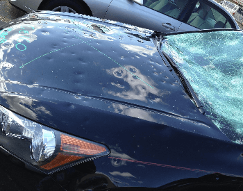 A car damaged by hail