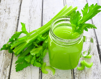 A picture of celery that has be turned into juice