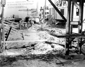 A picture of damage to substain 1010 dock at Pearl Harbor after the attack