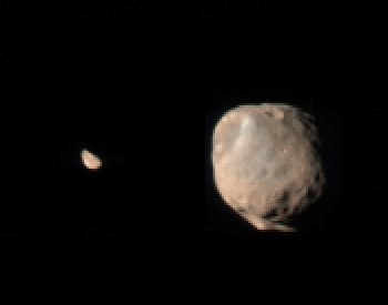 A photo of Deimos moon (left) compared to Phobos moon (right)