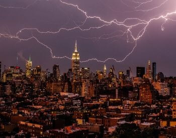 A picture of the Empire State Building and lightning