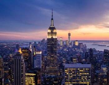 A picture of the Empire State Building at sunset