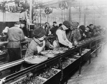 A picture of the Ford assembly line in 1913