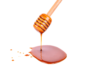 A picture of honey on a honey dripper