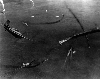 A photo of Japanese and American aircraft fighting in the air