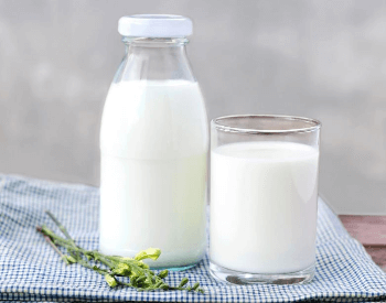A picture of milk, a food with a good source of protein