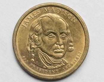A picture of a U.S. one dollar coin with James Madison