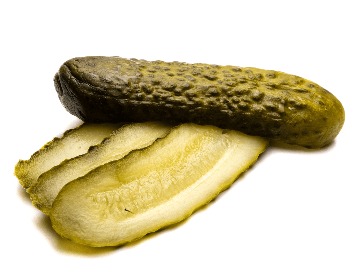 A picture of a pickled sliced in half