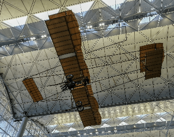A picture of a replica of the Wright Flyer