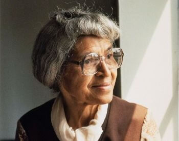 A picture of Rosa Parks in 1978 looking out a window