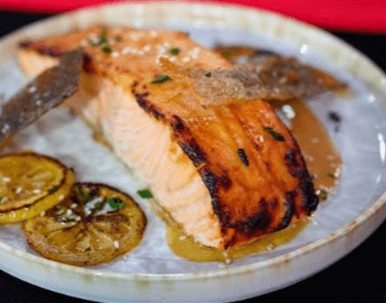 A picture of salmon, a food with a good source of protein