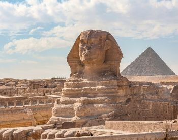 A picture of the Sphinx statue near the Giza Pyramids
