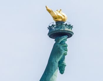 A close-up picture of the torch on the Statue of Liberty