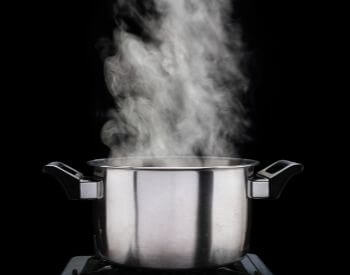 A picture of steam from boiling water that was created by the evaporation process
