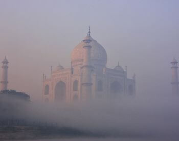 A picture of the Taj Mahal on a foggy day