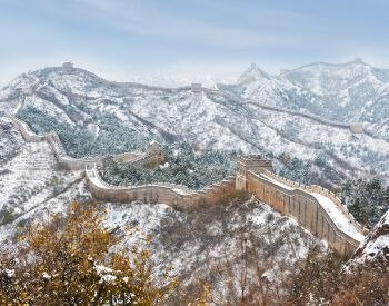 A picture of the Great Wall of China covered in snow