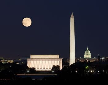 A picture of the Washington Monument and the Moon