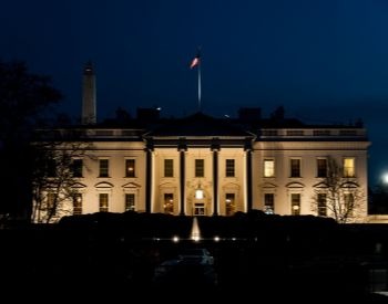 A picture of the White House at night