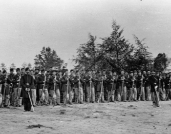 A picture of Union soliders by their camp and who fought at the Battle of Gettyburg