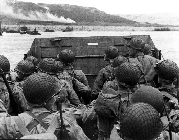 A picture of U.S. soliders on a landing craft on the coast of France