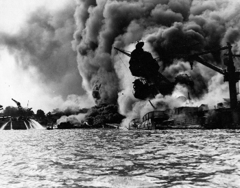 A picture of the USS Arizona (BB-39) sunk and burning after the attack