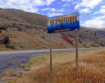 A picture of a sign that says welcome to Wyoming
