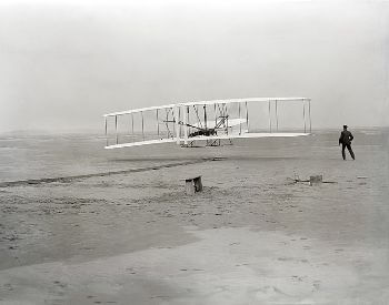 A picture of the first flight of the Wright Flyer